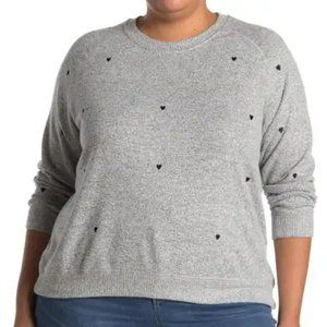 Gray workshop sweater with heart pattern